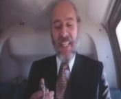 Old bearded man in a suit getting head in a helicopter from the man in the suit fan film