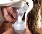 Hot young Latina Angela pumps milk from her nipple 2 from anghela auto drip milk lactating