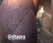 Rita Ora dancing outside in a pink dress from nude rucha hasbanian nudeদেশের