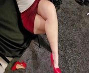Red heels and red painted toes from cross leg smoking