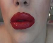 Heavy applied lipstick lips from lipstck kiss