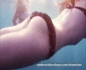 Nastya and Masha are swimming nude in the sea from xxx american sea shore camera