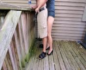 Holding my boyfriend&apos;s dick while he pisses off the deck | outside piss | high heels | sexy legs from girl holding dick and giving handjob video